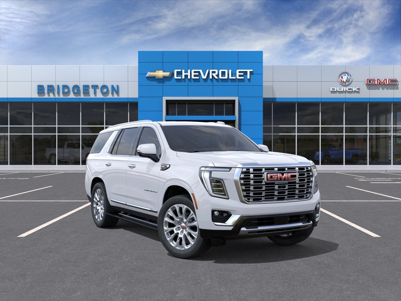 2026 GMC Yukon Denali in Summit White — front three-quarter view