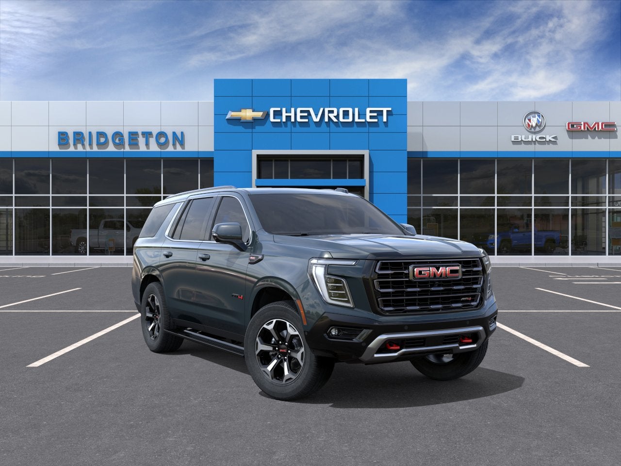 2026 GMC Yukon AT4 Ultimate in Midnight Pine — front three-quarter view