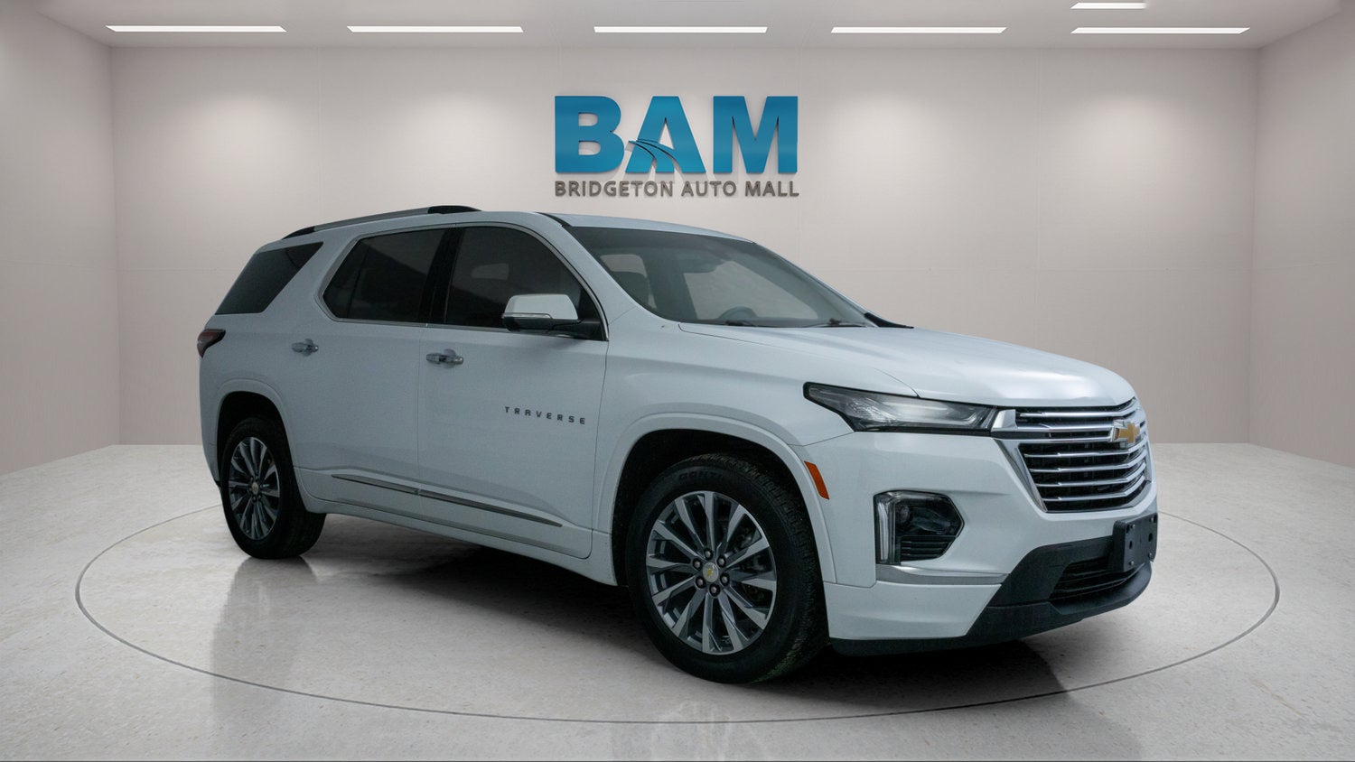 2023 Chevrolet Traverse Premier in Summit White — front three-quarter view
