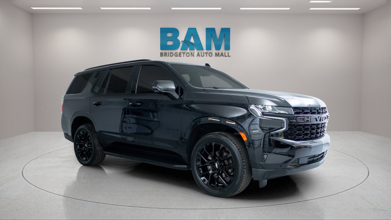 2023 Chevrolet Tahoe RST in Black — front three-quarter view