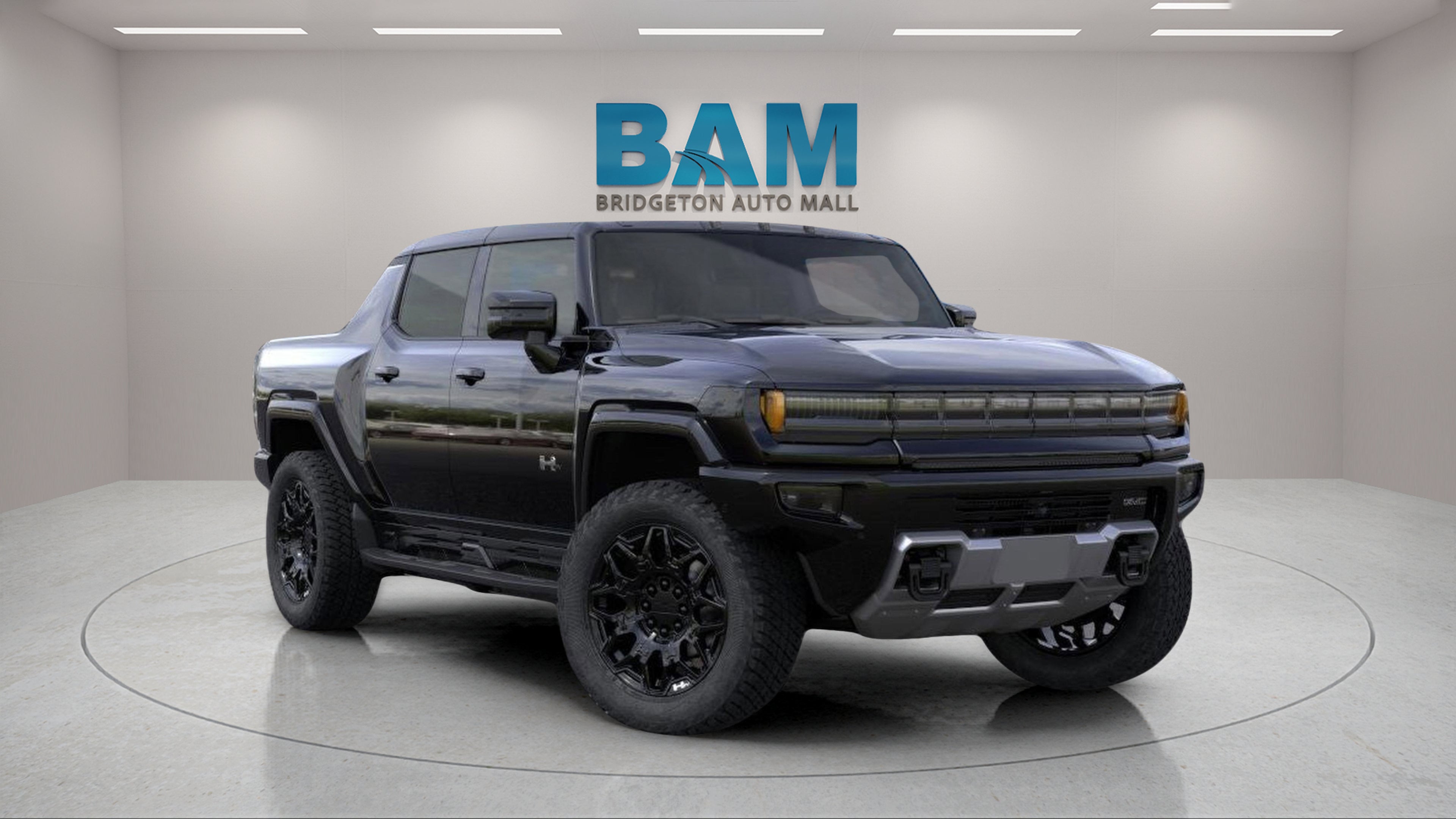 2026 GMC HUMMER EV Pickup 2X in Void Black — front three-quarter view