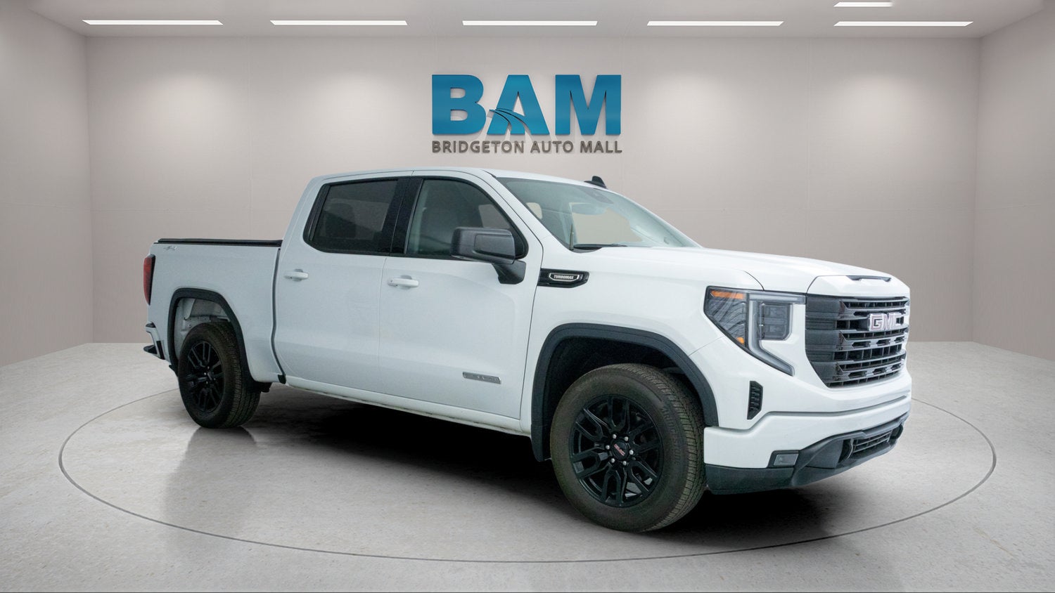 2024 GMC Sierra 1500 Elevation in Summit White — front three-quarter view