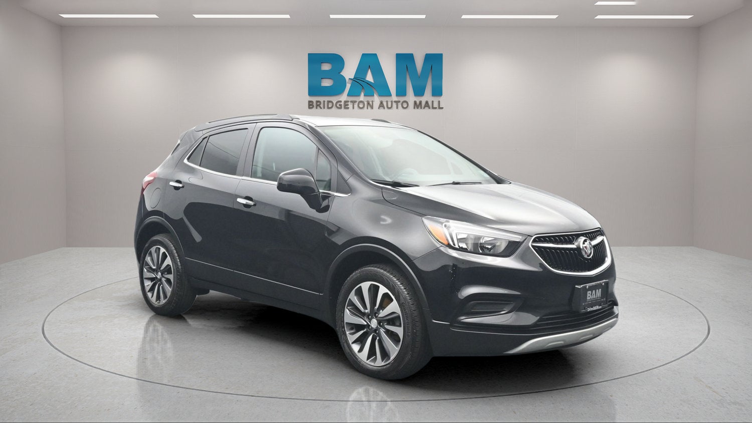 2022 Buick Encore Preferred in Ebony Twilight Metallic — front three-quarter view